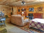 Holly Hill Ocoee River area cabin rental- lower living area with full size bed